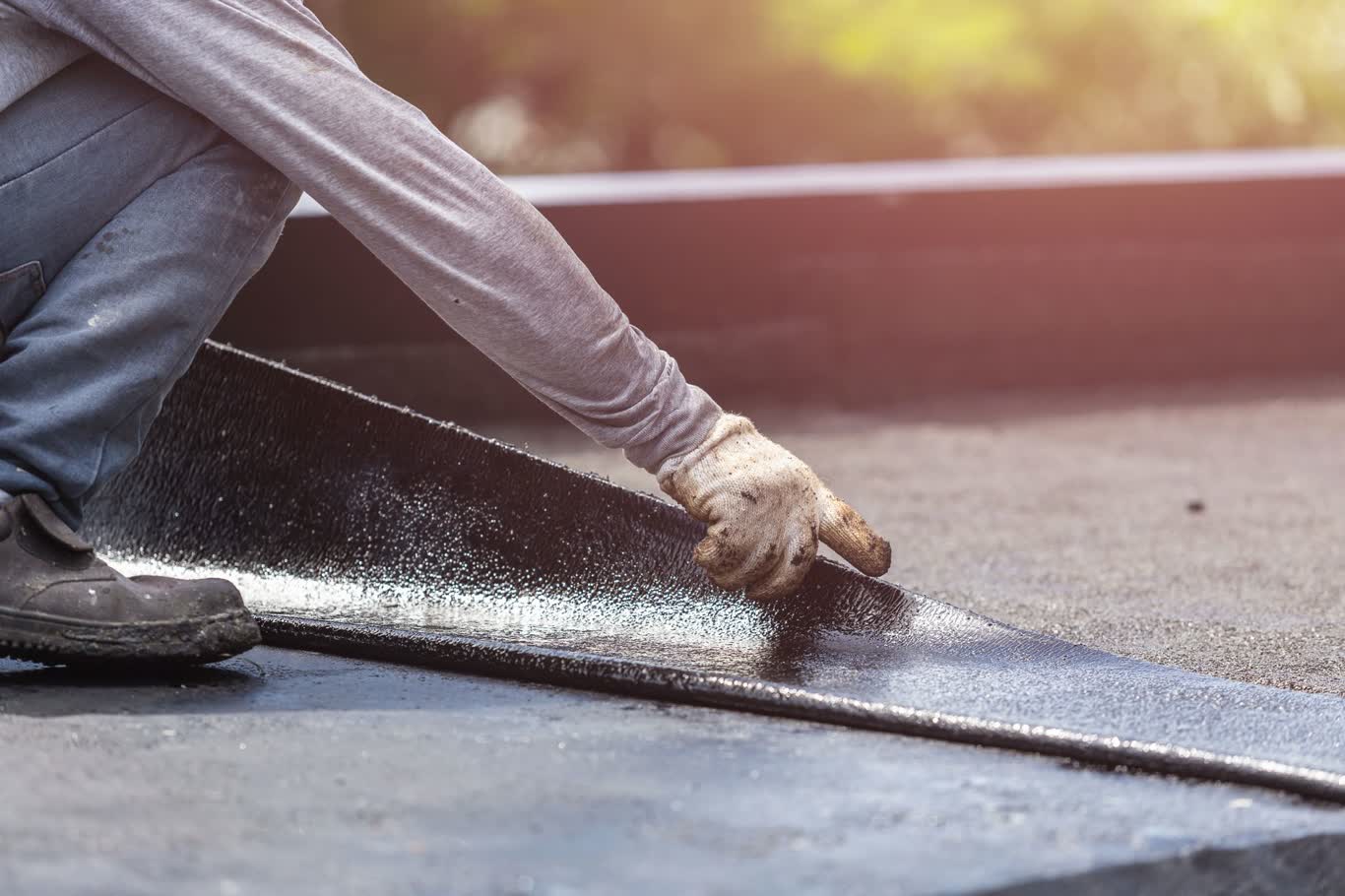 Secondary water barrier being installed on a Treasure Coast roof deck during a hurricane-mitigation re-roof