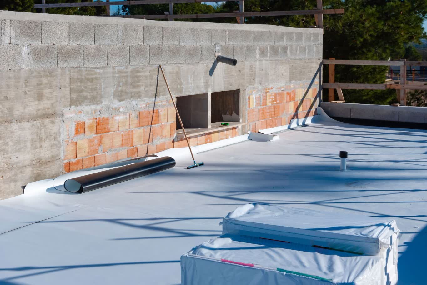 Flat roof ponding water repair on a low-slope residential property in South Florida