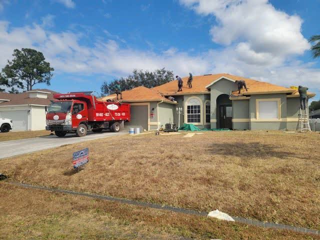 Dalton Roofing crew installing asphalt shingles on a Port St. Lucie home