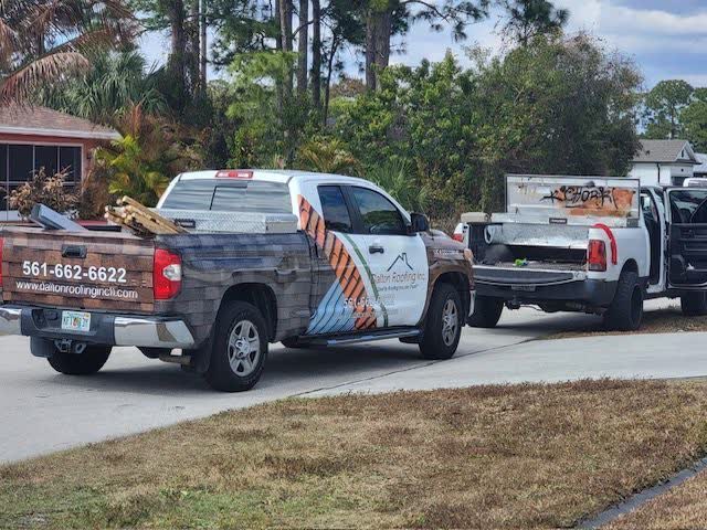 Dalton Roofing licensed crew inspecting asphalt shingles in South Florida